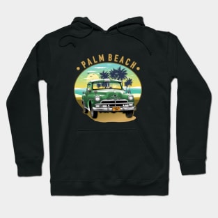 Green classic car on the palm beach in summer Hoodie